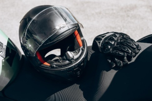 motorbike helmet and gloves on finance